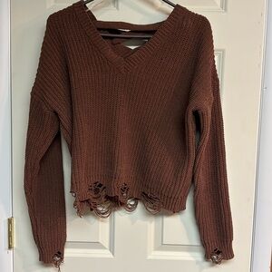 Distressed sweater
